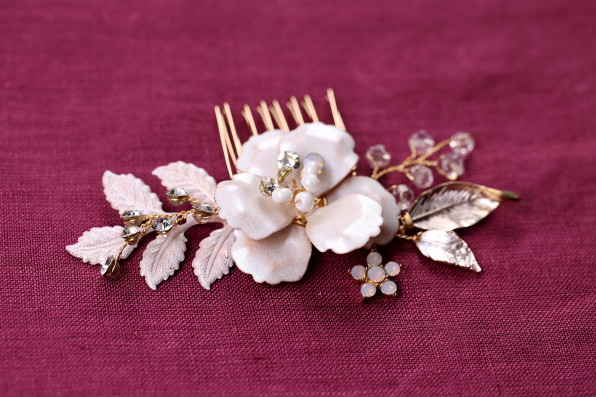 a close up of a hair comb with flowers on it