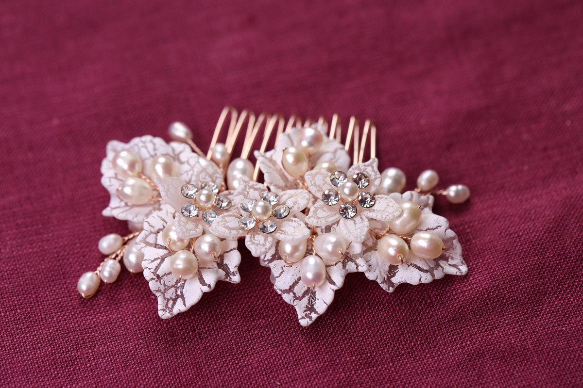 a close up of a hair comb with flowers on it