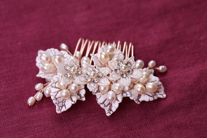 a close up of a hair comb with flowers on it