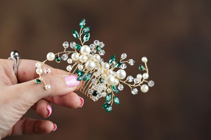 a close up of a person holding a brooch