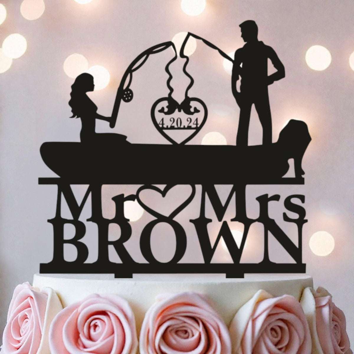 A silhouette of a man and a woman fishing on a boat, with the text "Mr. Brown" and "Mrs. Brown" written below them.