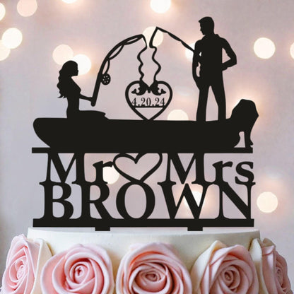 A silhouette of a man and a woman fishing on a boat, with the text "Mr. Brown" and "Mrs. Brown" written below them.