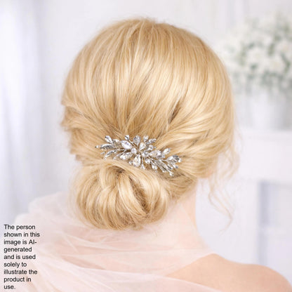 a close-up view of a woman's blonde hair with a decorative hair accessory, possibly a hair clip or brooch, on the back of her head.