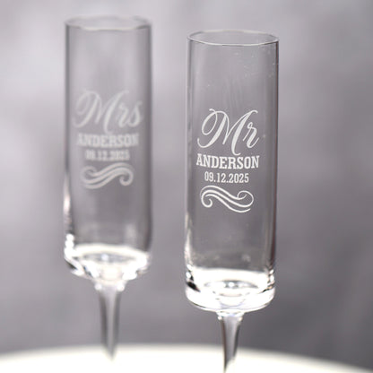 a couple of wine glasses sitting on top of a table