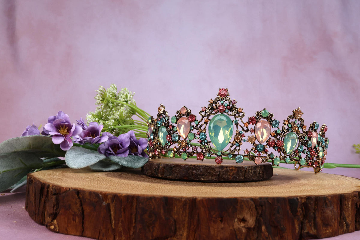 a tiara sitting on top of a tree stump
