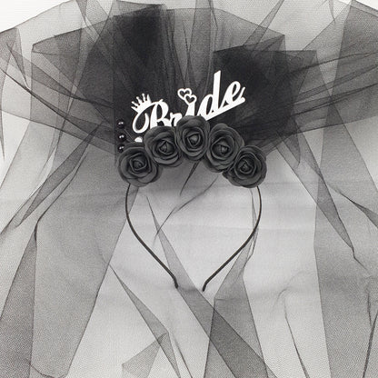 a black and white photo of a bride's hair comb