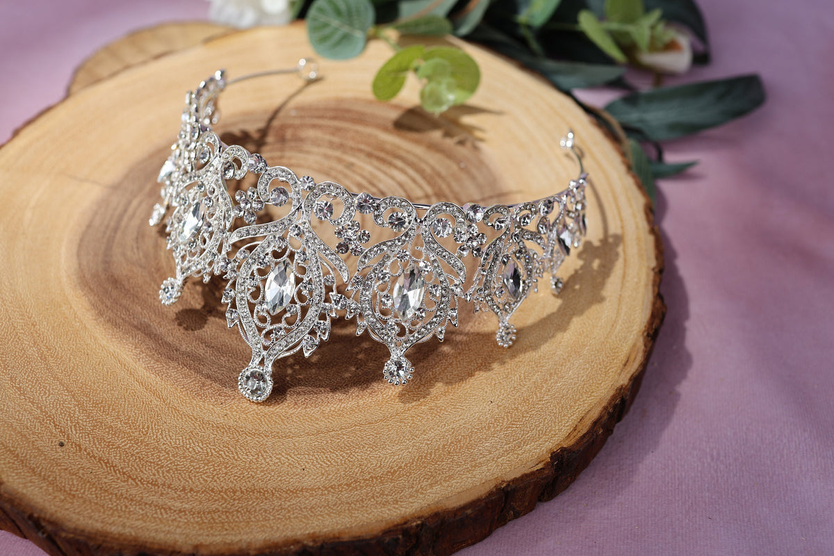 a close up of a tiara on a piece of wood