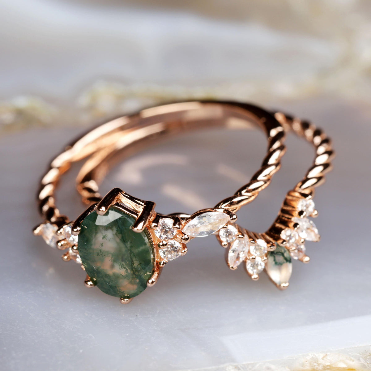 a close up of two rings on a table