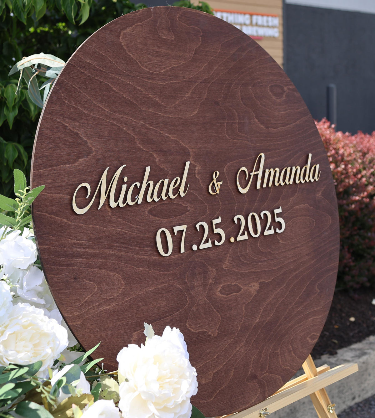 a wooden sign that says michael and amanda on it