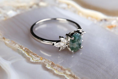 a close up of a ring on a marble surface