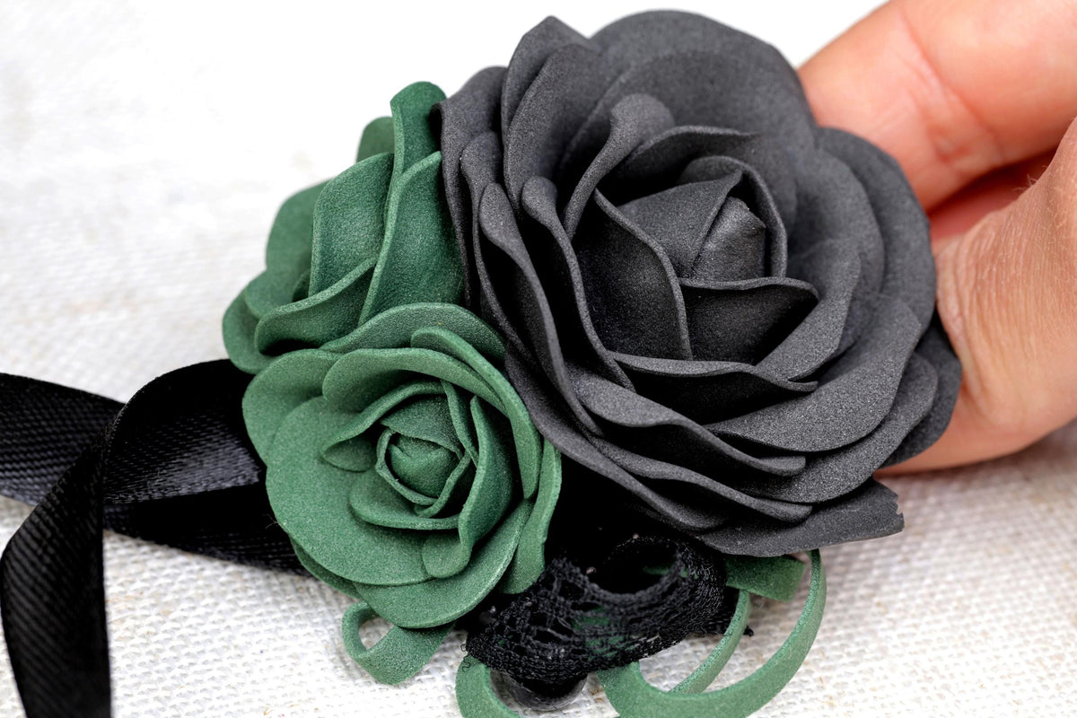 a close up of a person holding a flower