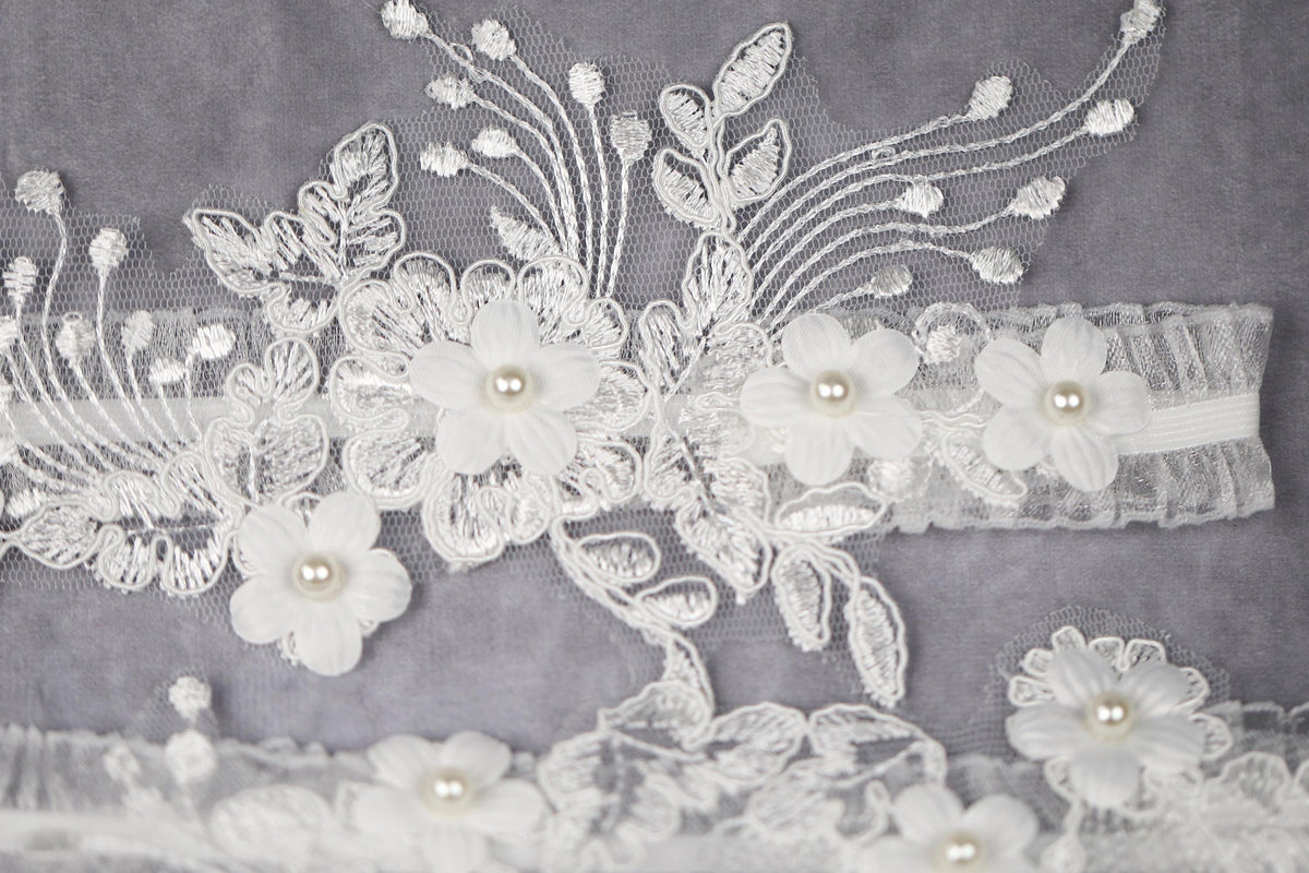 a close up of a dress with flowers on it