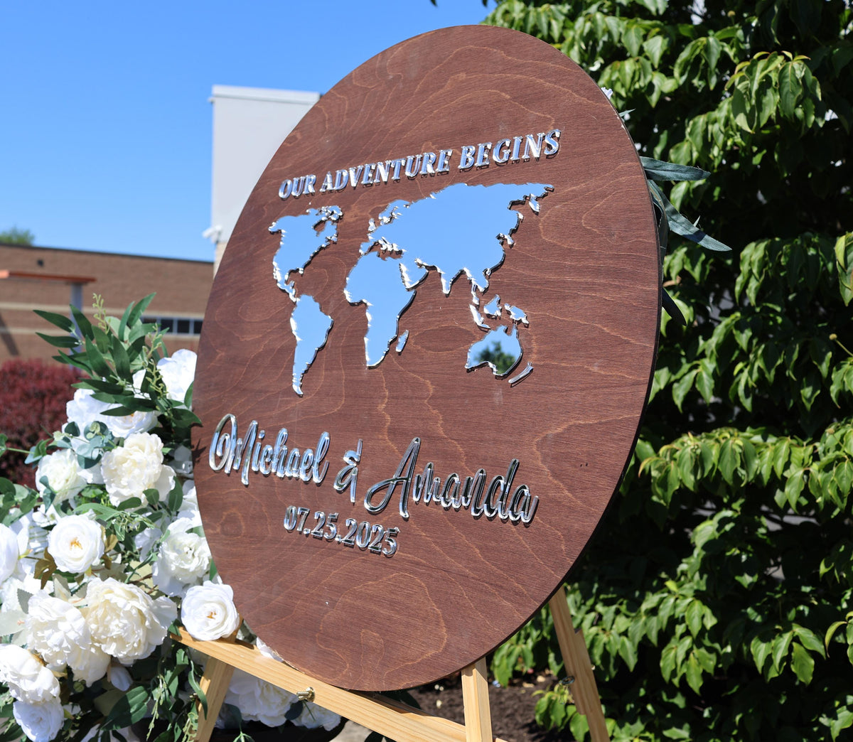 a wooden sign with a map of the world on it