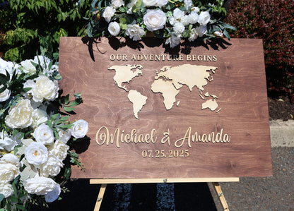 a wooden sign with a world map on it