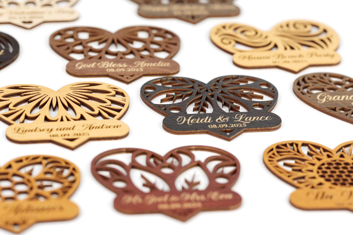 a collection of heart-shaped wooden tags or ornaments, each with a personalized message engraved on it. The tags are arranged in a grid-like pattern, showcasing various designs and sizes.