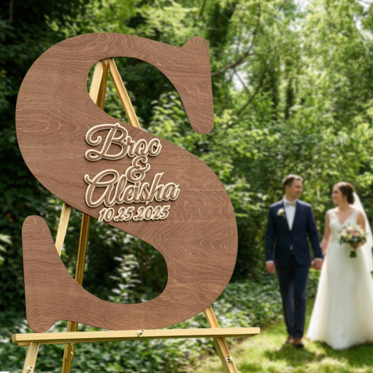 A couple dressed in wedding attire walking hand in hand in a lush, green outdoor setting.