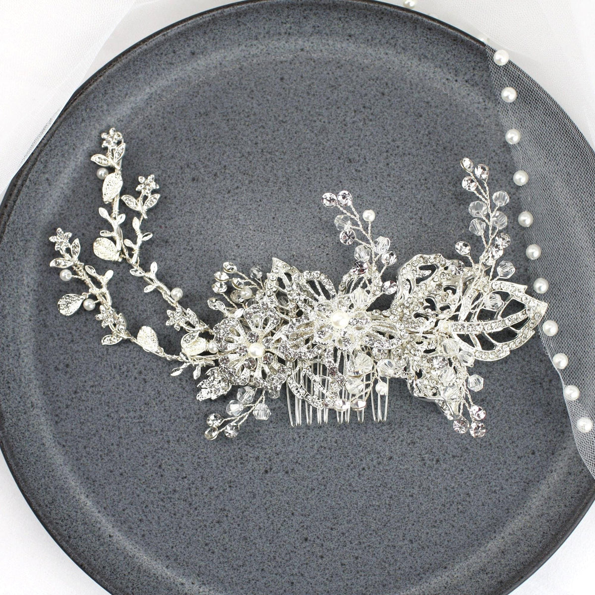 a close up of a hair comb on a plate