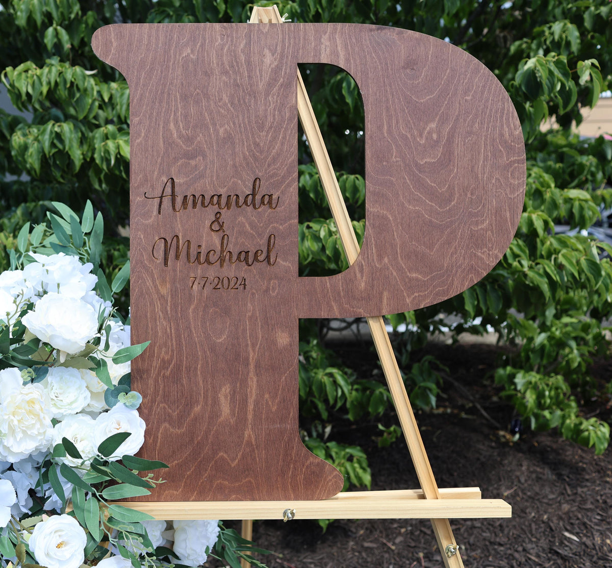 a wooden sign that says amanda and michael