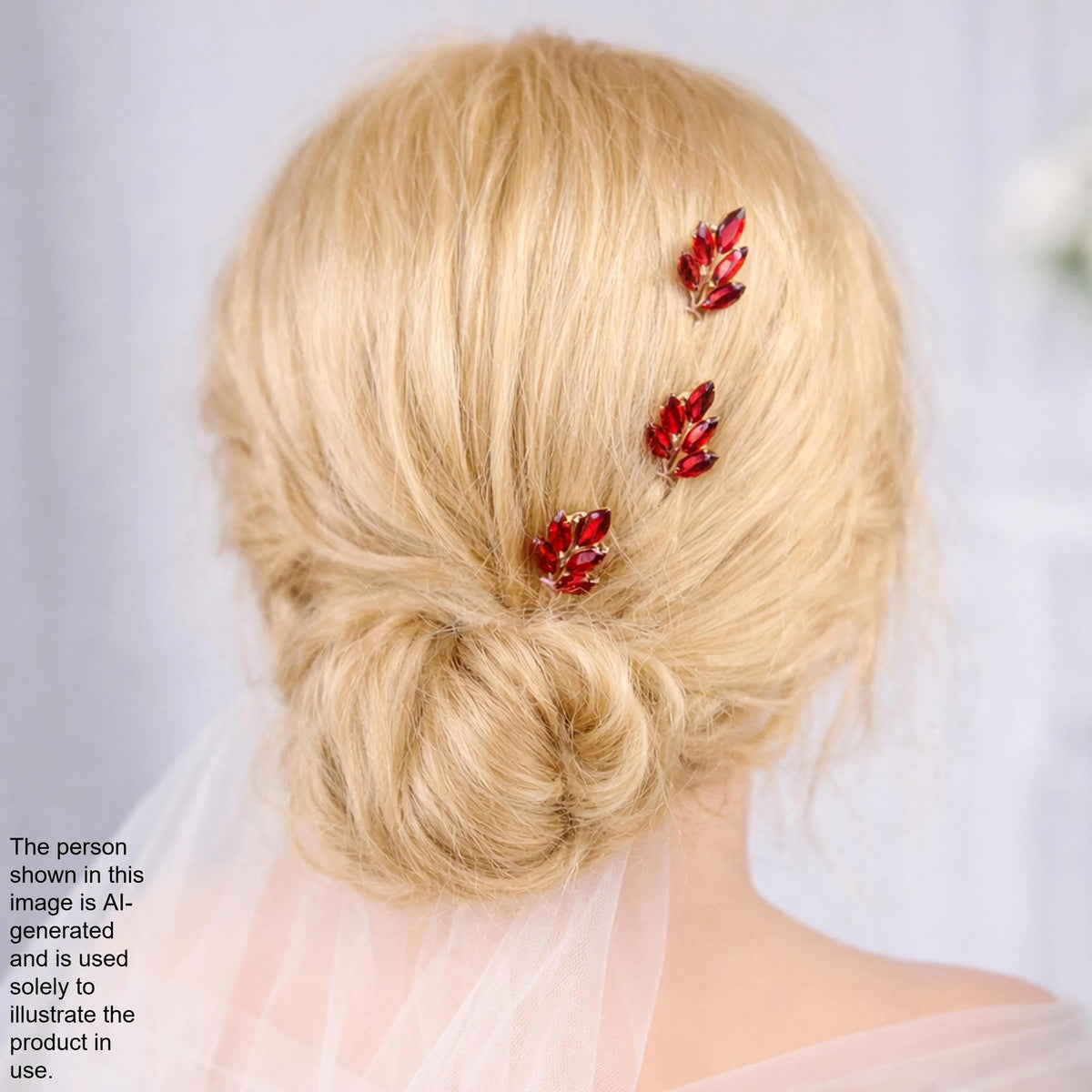 a close-up view of a woman's blonde hair with three red floral hair clips.