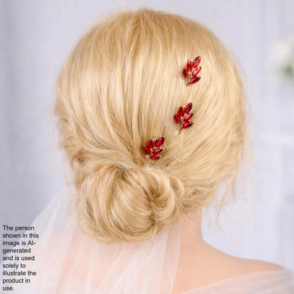 a close-up view of a woman's blonde hair with three red floral hair clips.