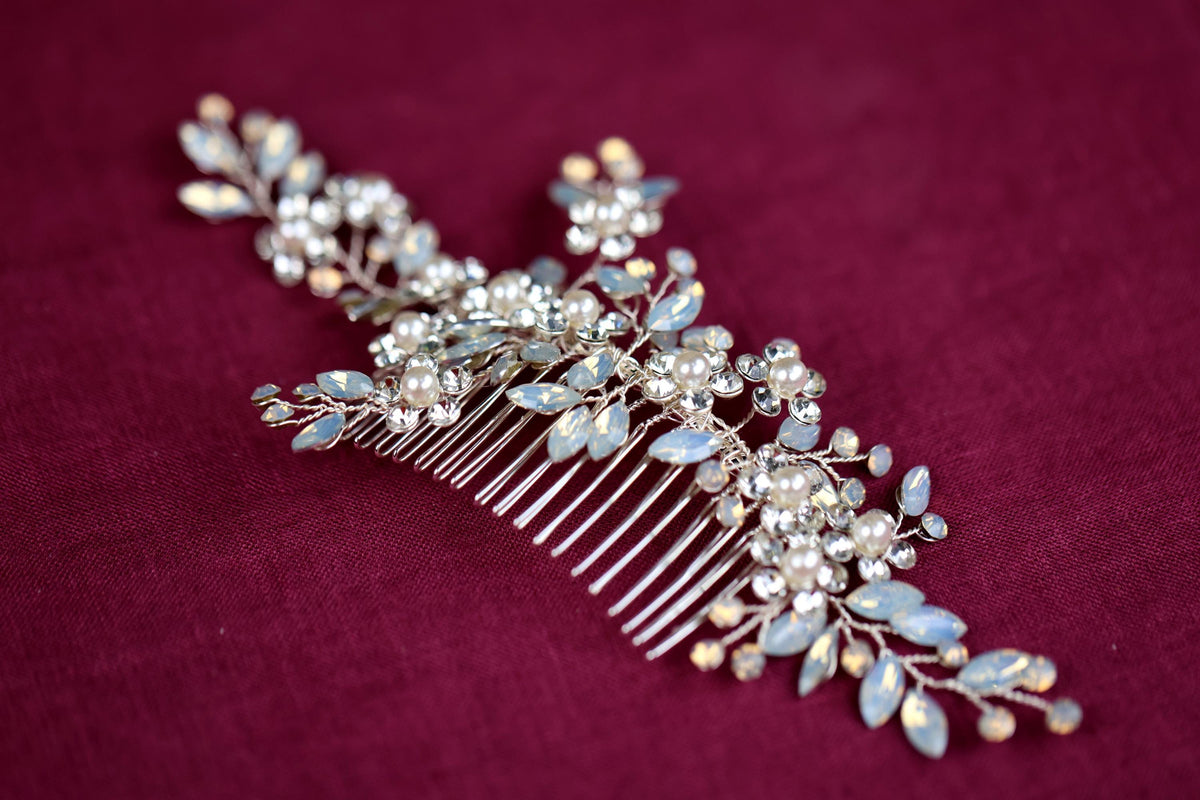 a bridal hair comb with pearls and leaves