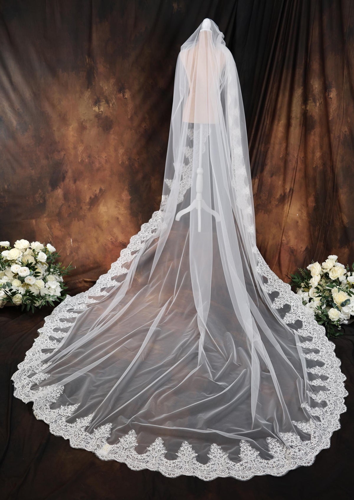 a wedding veil with a lace edge