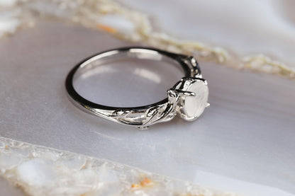 a close up of a ring on a marble surface