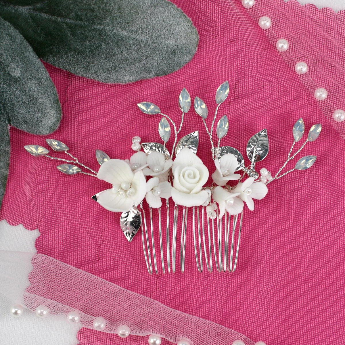 a close up of a hair comb with flowers on it