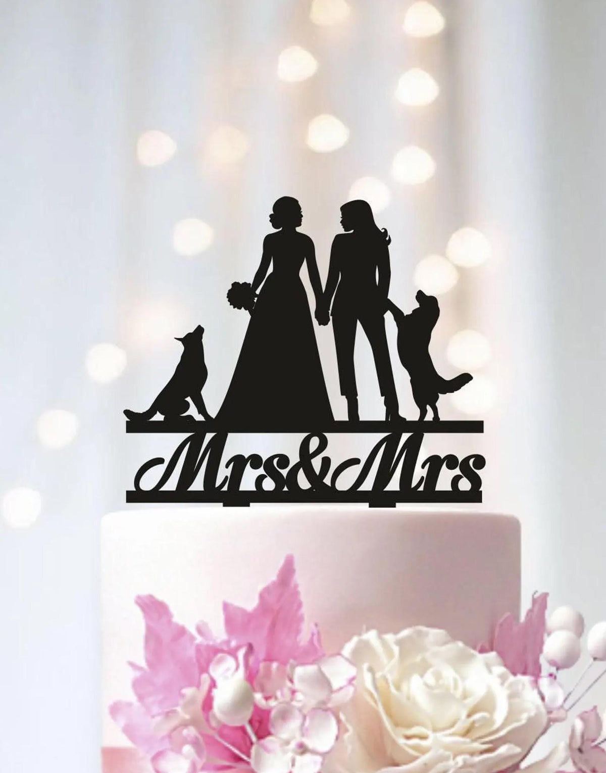 A silhouette of a bride and groom holding hands, with a dog and a flower on top of a cake.