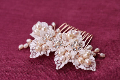 a close up of a hair comb with flowers on it