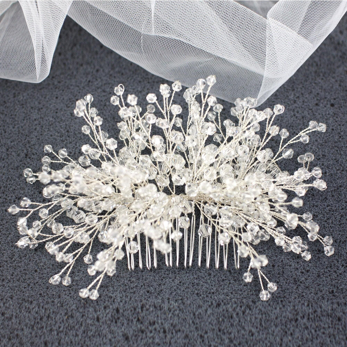 a close up of a wedding hair comb