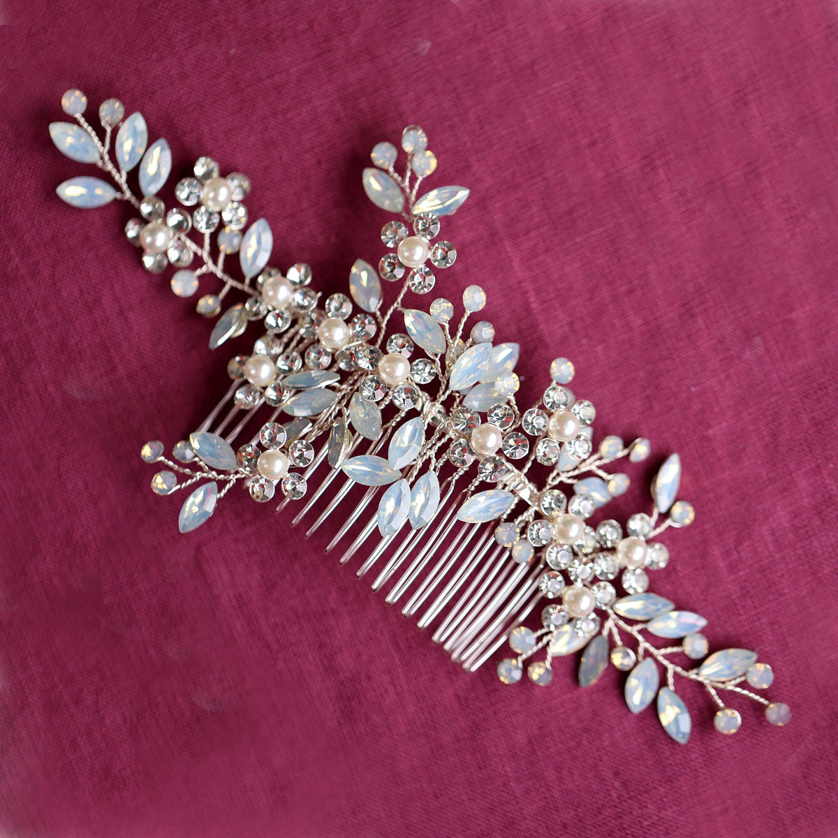 a bridal hair comb with pearls and leaves