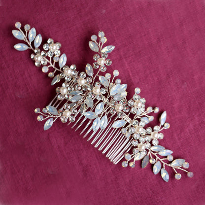 a bridal hair comb with pearls and leaves