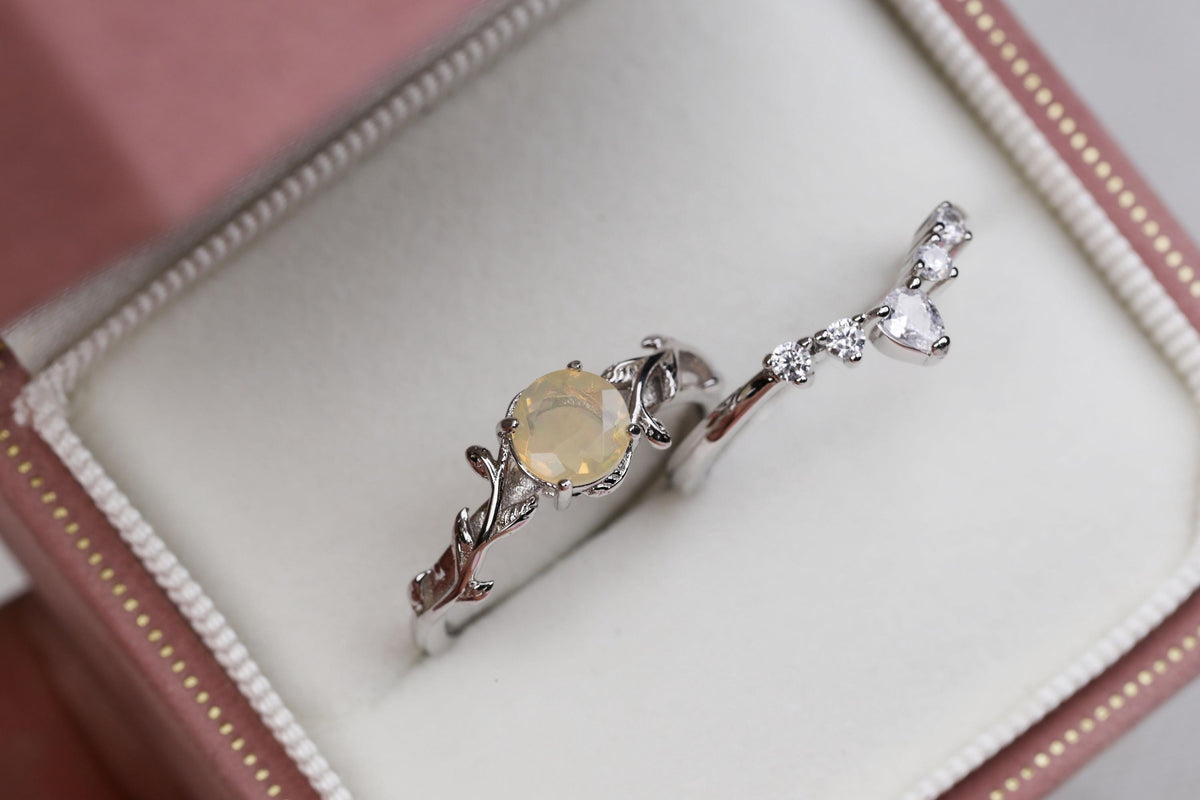 a close up of a ring in a box