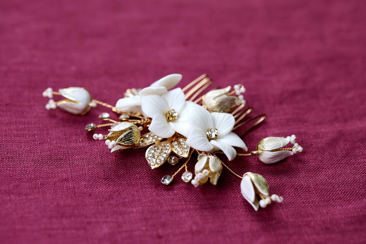 a close up of a hair comb with flowers on it