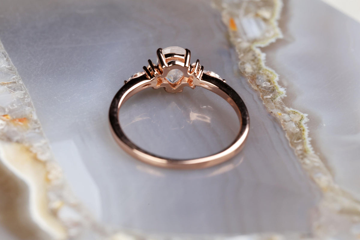 a close up of a ring on a rock