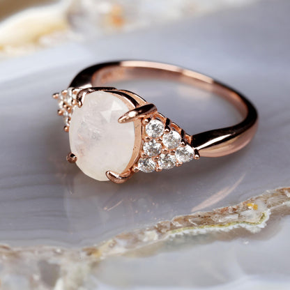 a close up of a ring on a rock