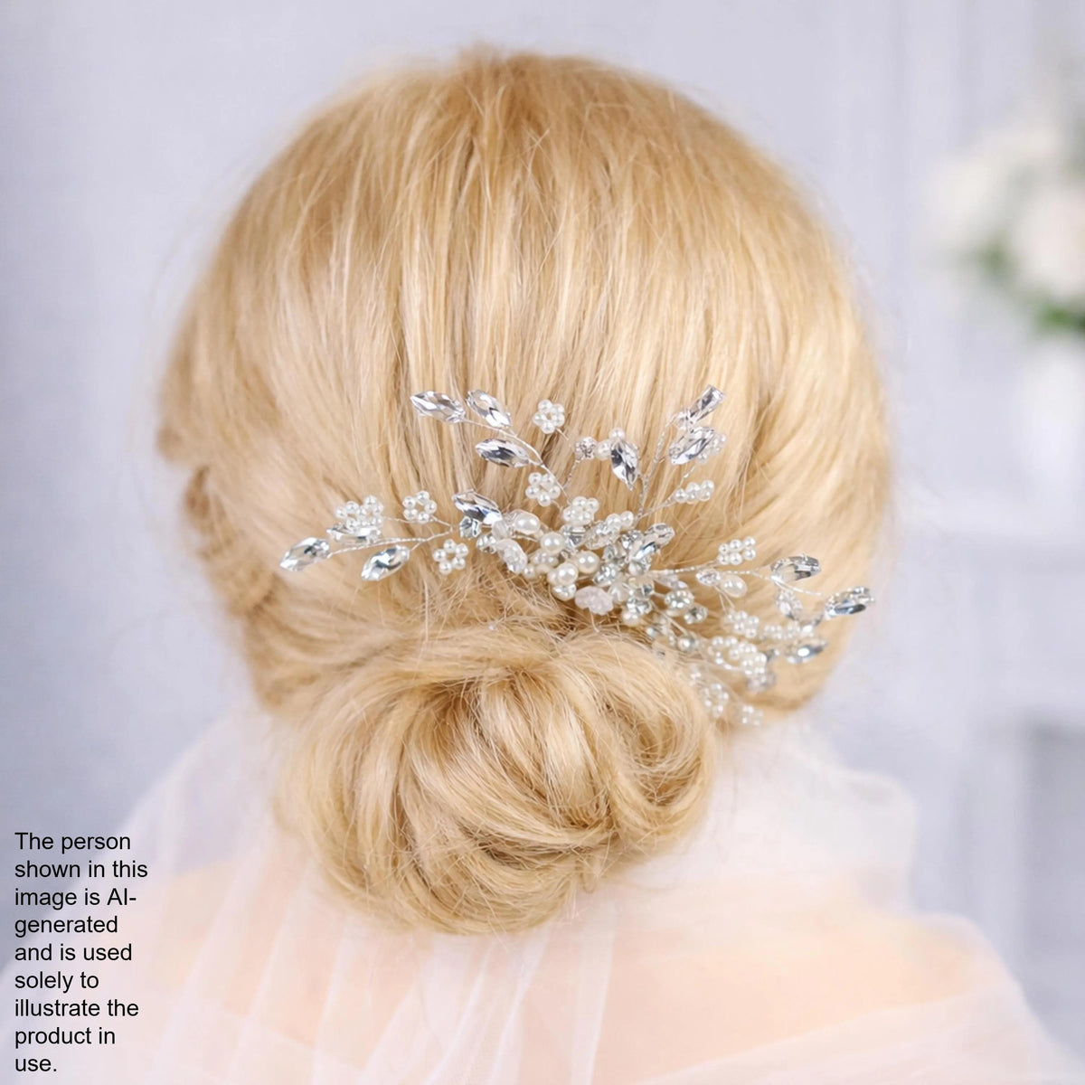 A close-up view of a woman's blonde hair with a decorative hair accessory, possibly a veil or headpiece, in the background.