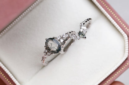 a close up of a ring in a box