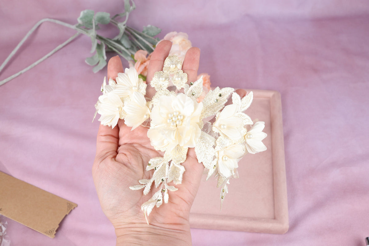 a person holding a bunch of flowers in their hand