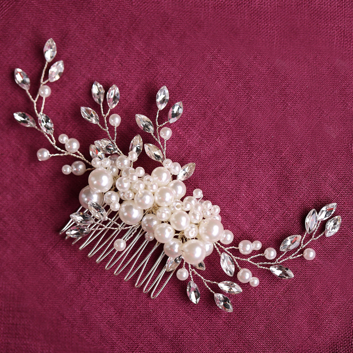 a close up of a hair comb with pearls