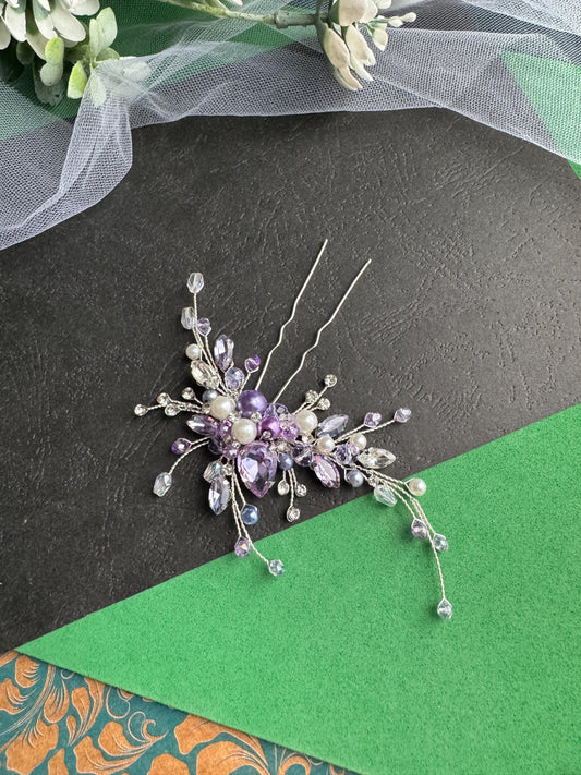 a brooch with a bunch of flowers on it