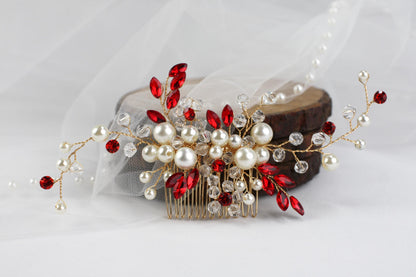 a bridal hair comb with red and white pearls