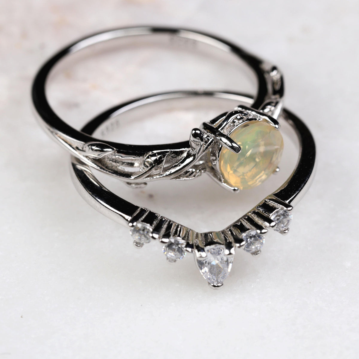a couple of rings sitting on top of a table