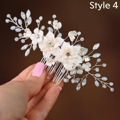 a close up of a person holding a hair comb