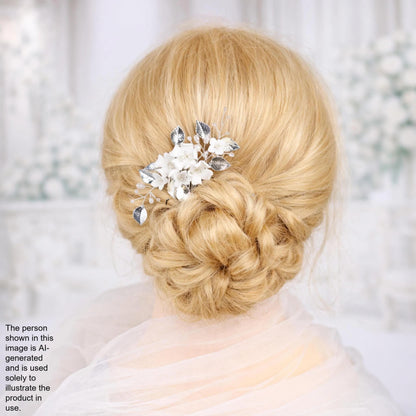 A close-up of a woman's blonde hair with a decorative hair accessory, such as a flower or crystal piece, in the back of her head.