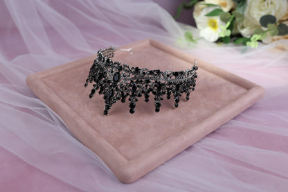 a close up of a tiara on a tray