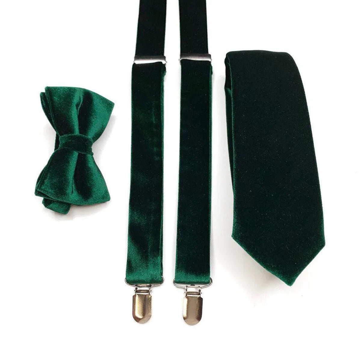 a set of formal men's accessories, including a green velvet bow tie, green velvet suspenders, and a green velvet tie clip.
