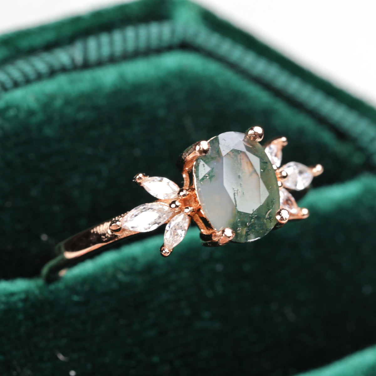 a close up of a ring in a box