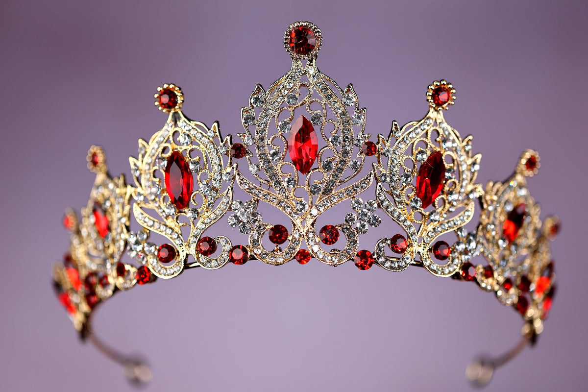 a tiara with a lot of red stones on it